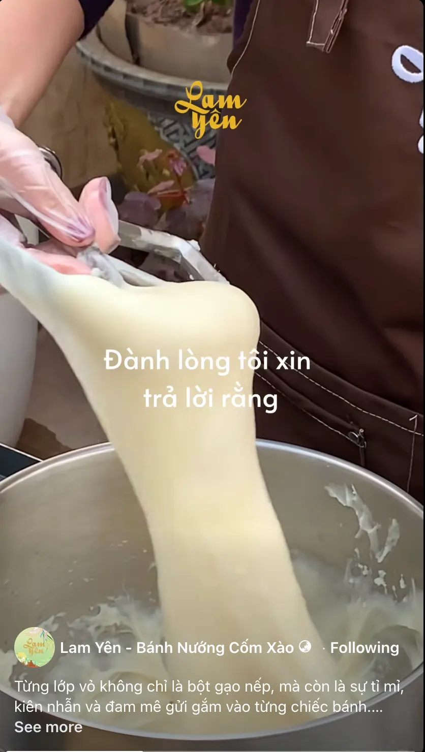 A video still: a gloved hand pulling a long stretch of white mochi dough out of a steel bowl, with the Lam Yên logo above and the words “Đành lòng tôi xin trả lời rằng”.